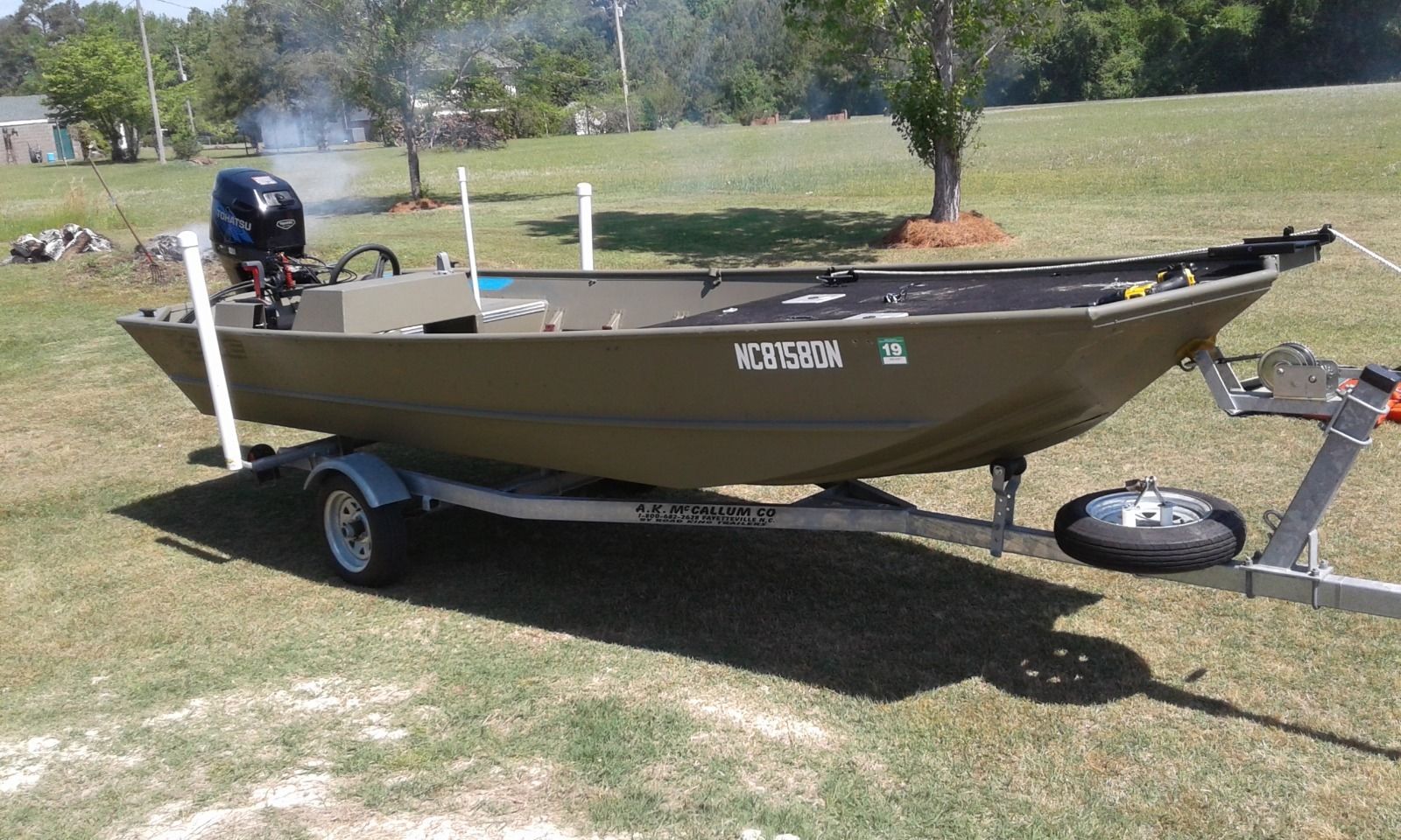 This is a 2009 Lowe 1648 Jon Boat with the modified V and comes with a Toha...