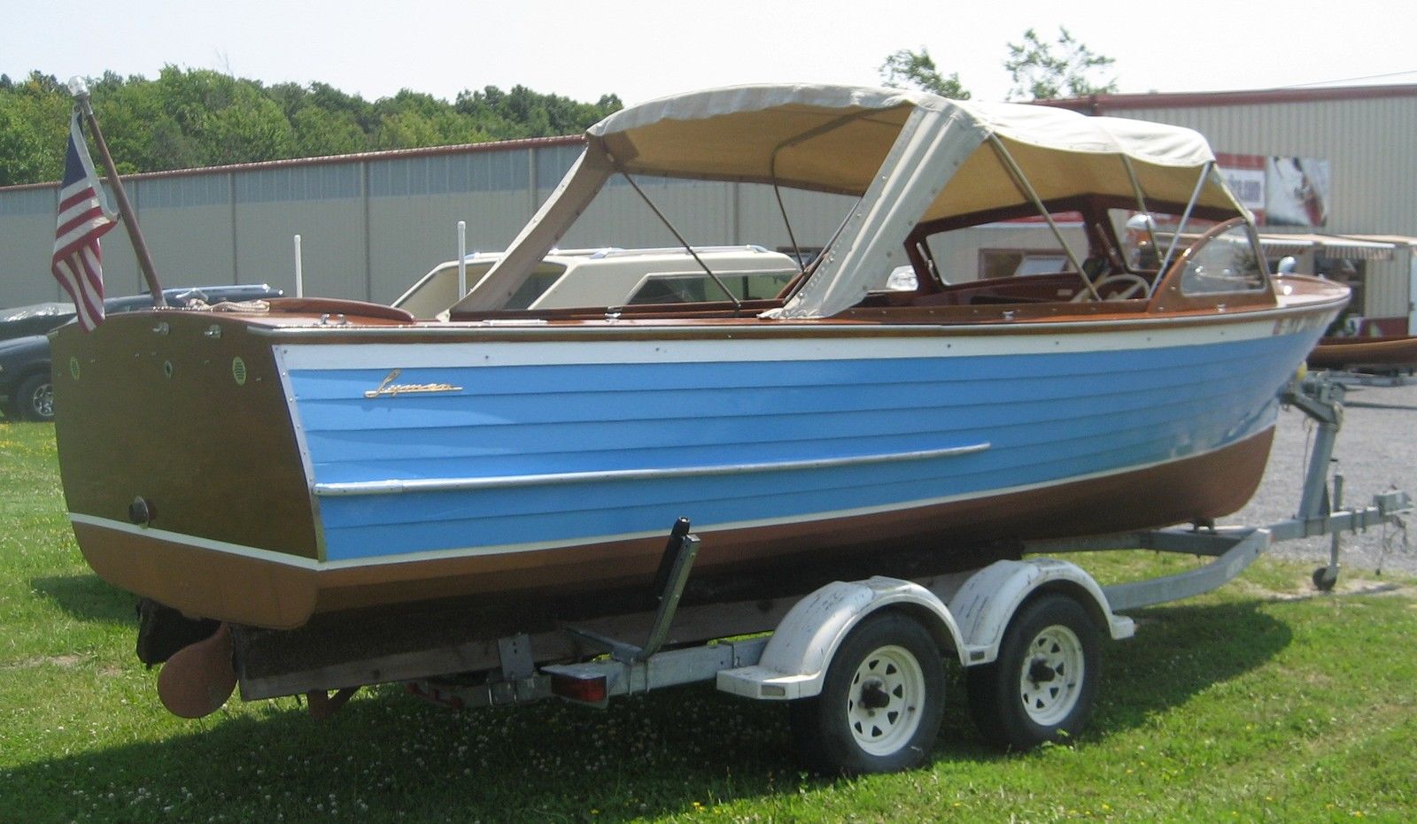 wood runabout with trailer