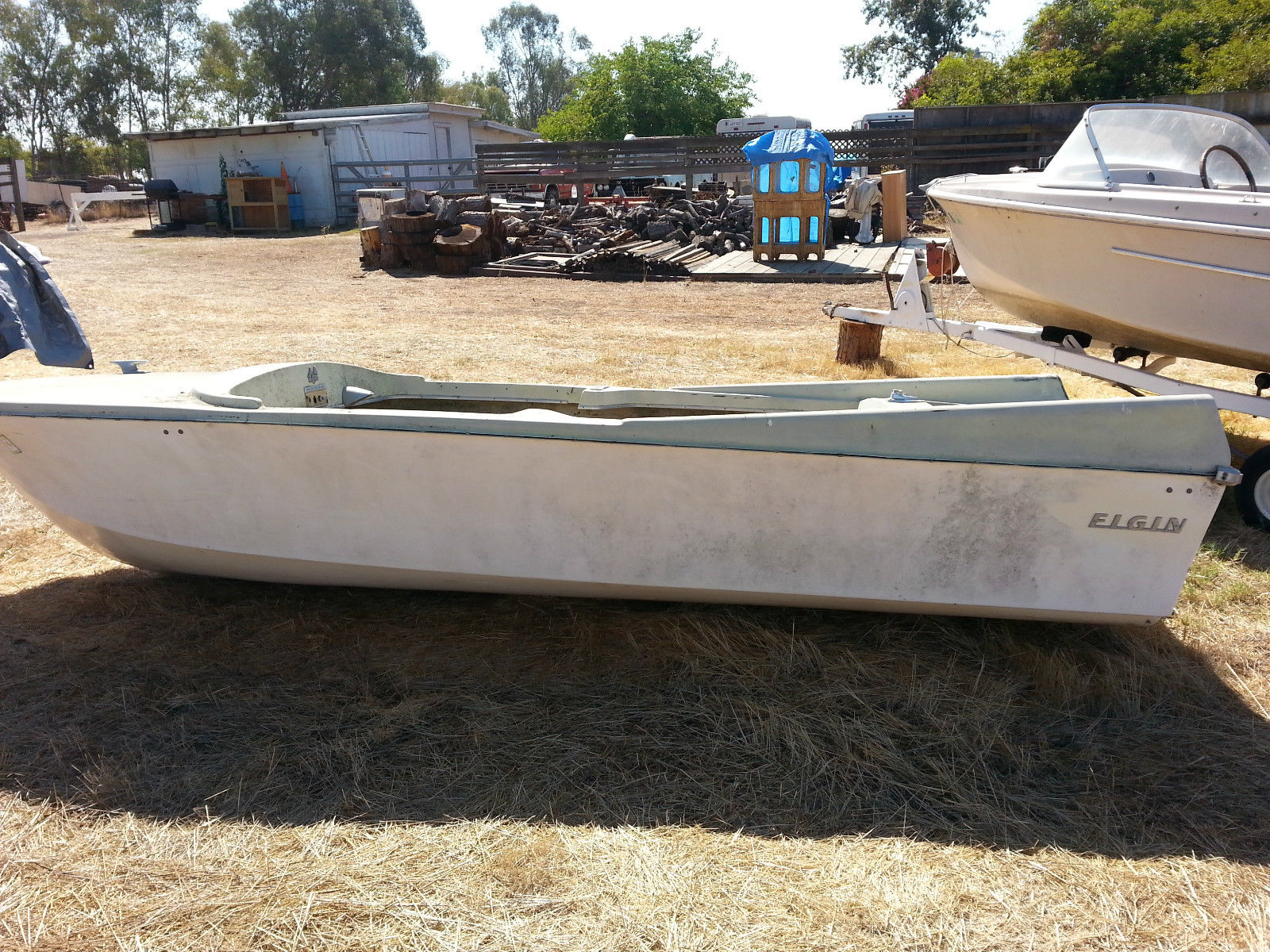 SEARS ELGIN RUNABOUT OUTBOARD BOAT This vintage Sears Elgin Runabout is a c...