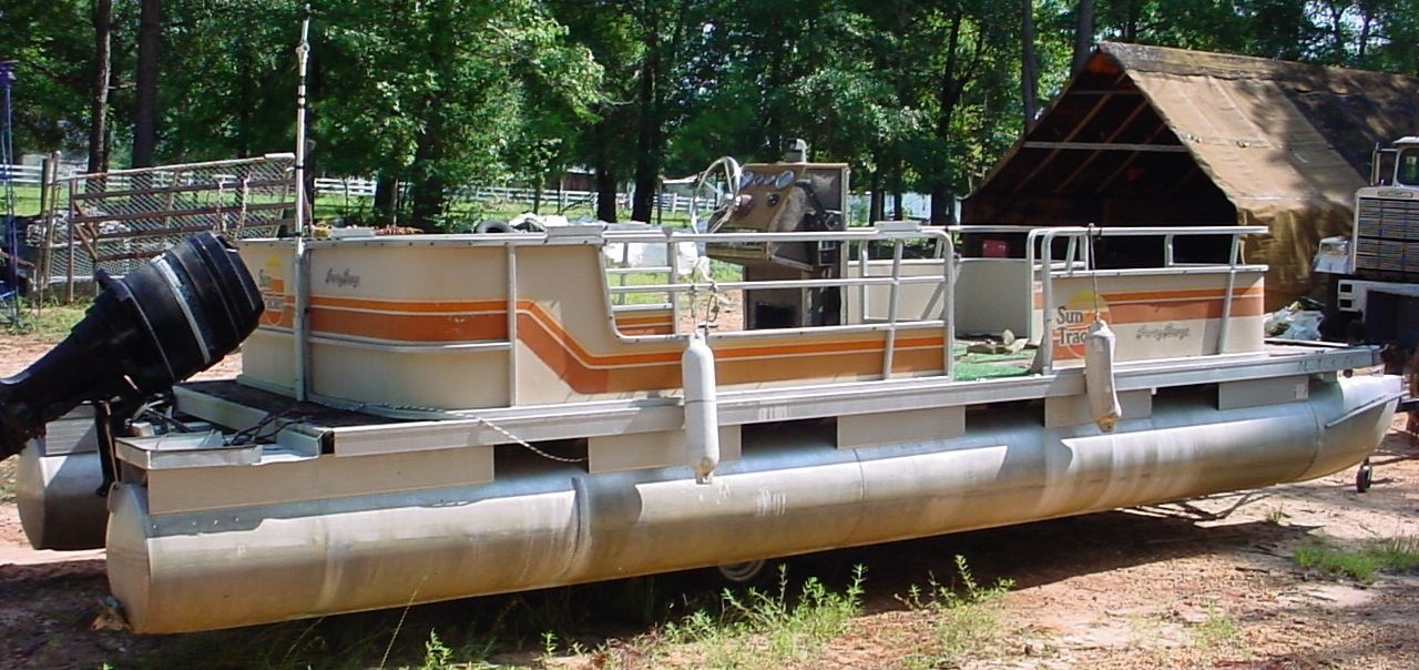 sun tracker pontoon with trailer.
