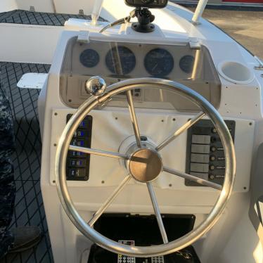 1985 Sea Ray boat fishing